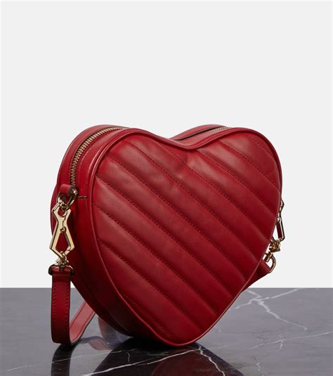 gucci heart bag aria|gucci heart shaped bag.